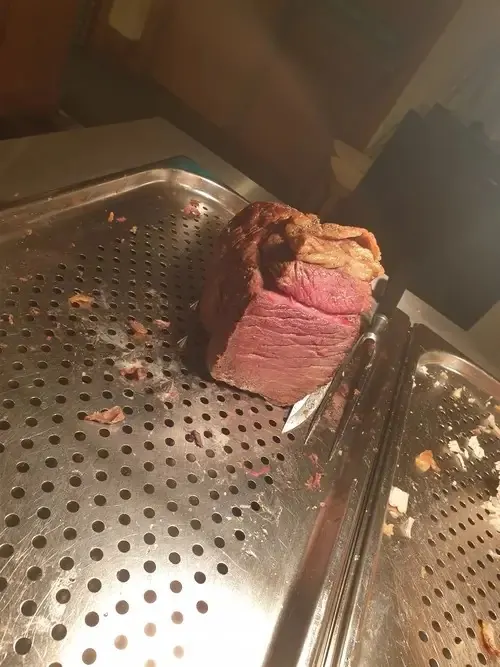 Freshly carved roast beef joint at Enigma's carvery
