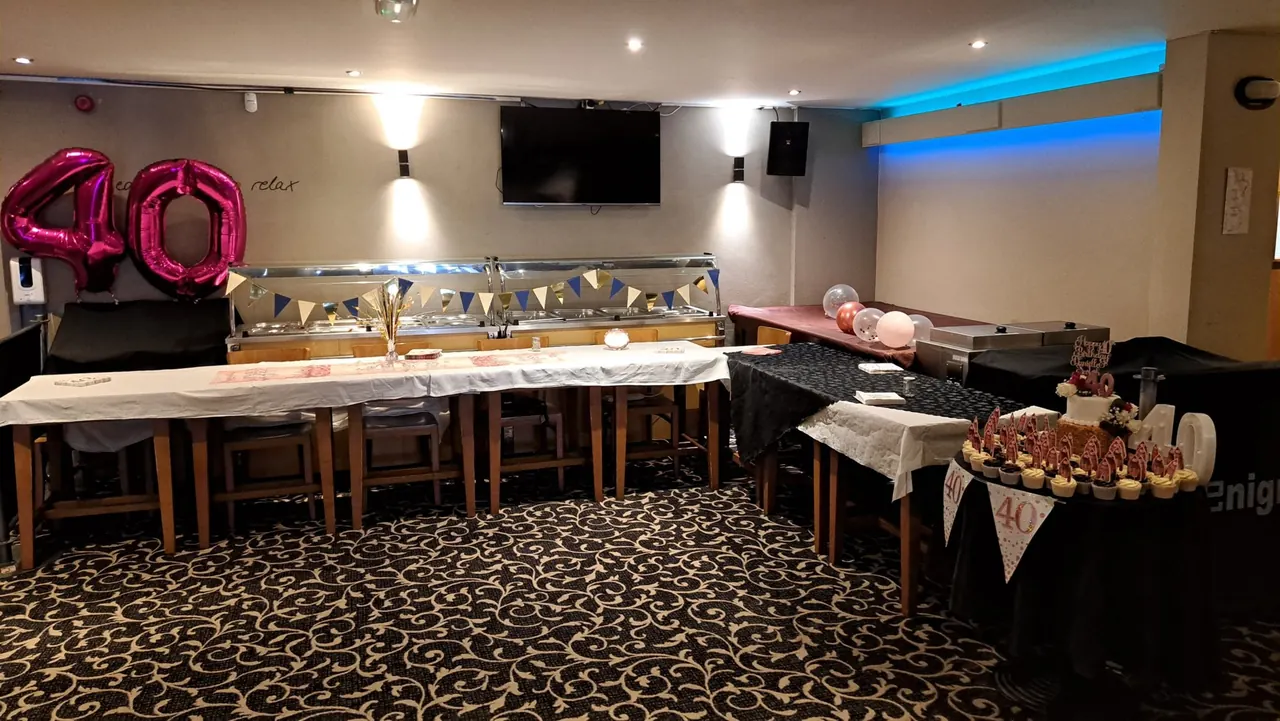 Enigma's function room set up with buffet for a 40th birthday party
