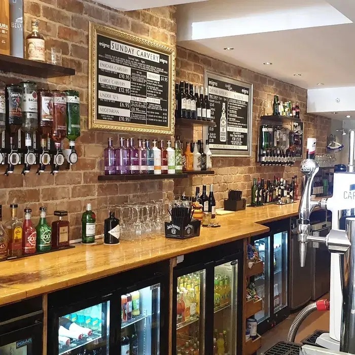 Enigma's bar with drinks chalkboards